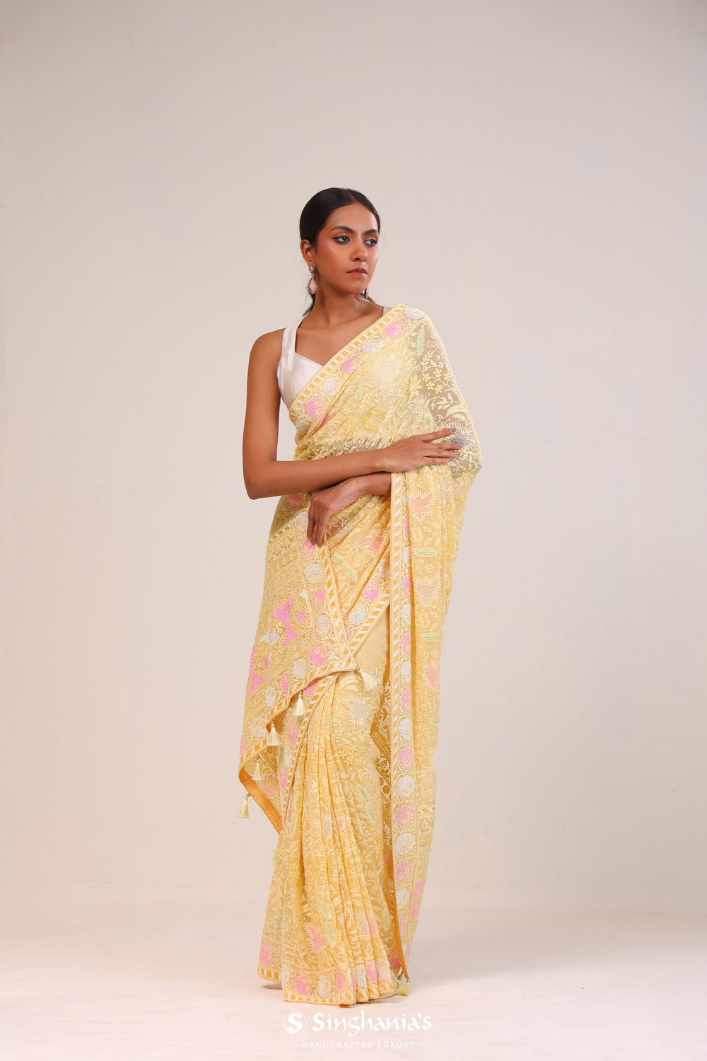 Mocassin Yellow Georgette Lucknowi Saree