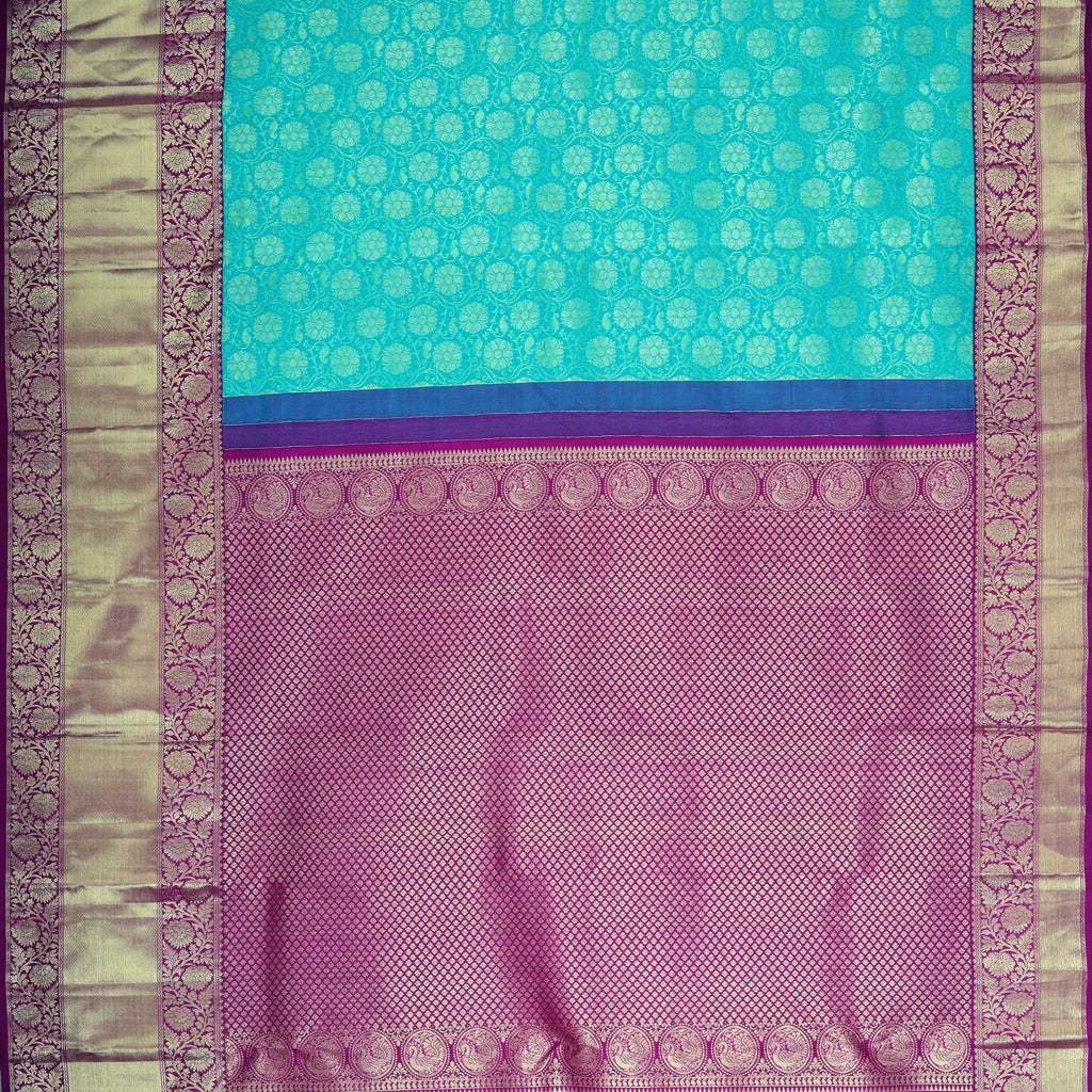 cyan colour saree with contrast blouse