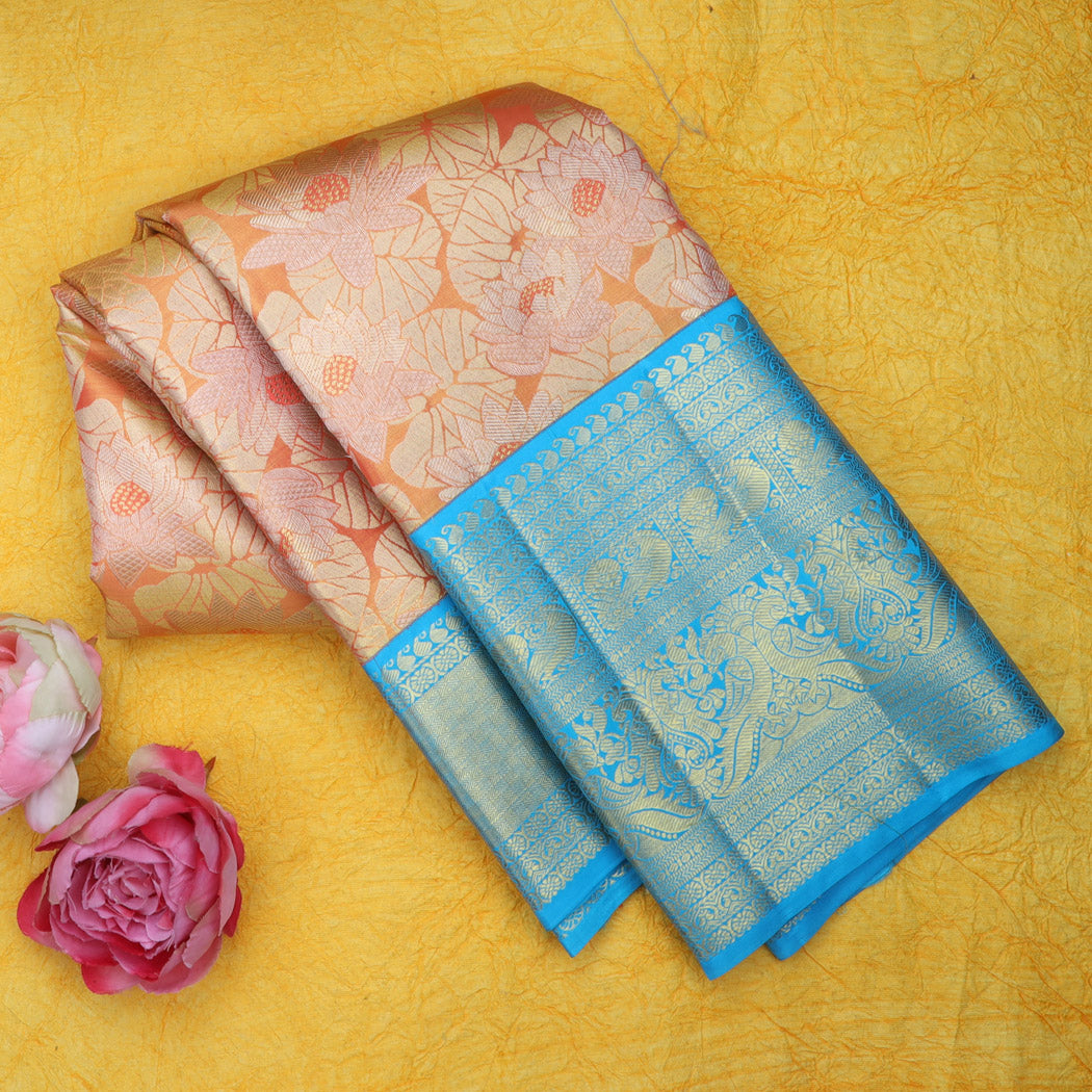 Pastel Orange Kanjivaram Silk Saree With Floral Pattern