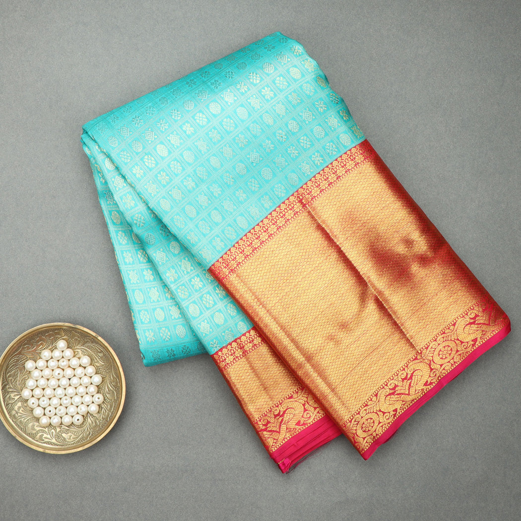 Blue Kanjivaram Silk Saree With Tiny Floral Buttis