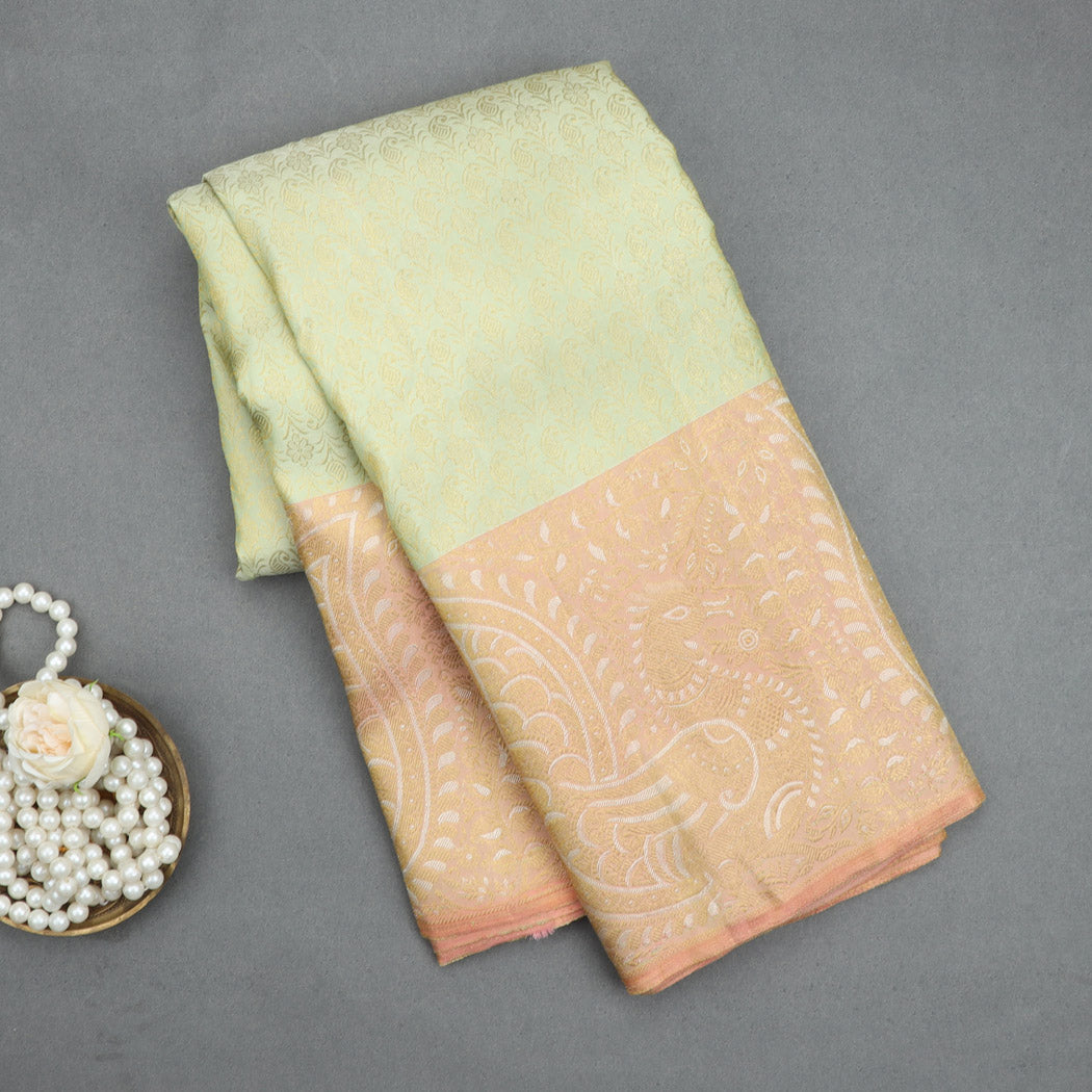 Pastel Green Kanjivaram Silk Saree With Floral Motif Pattern