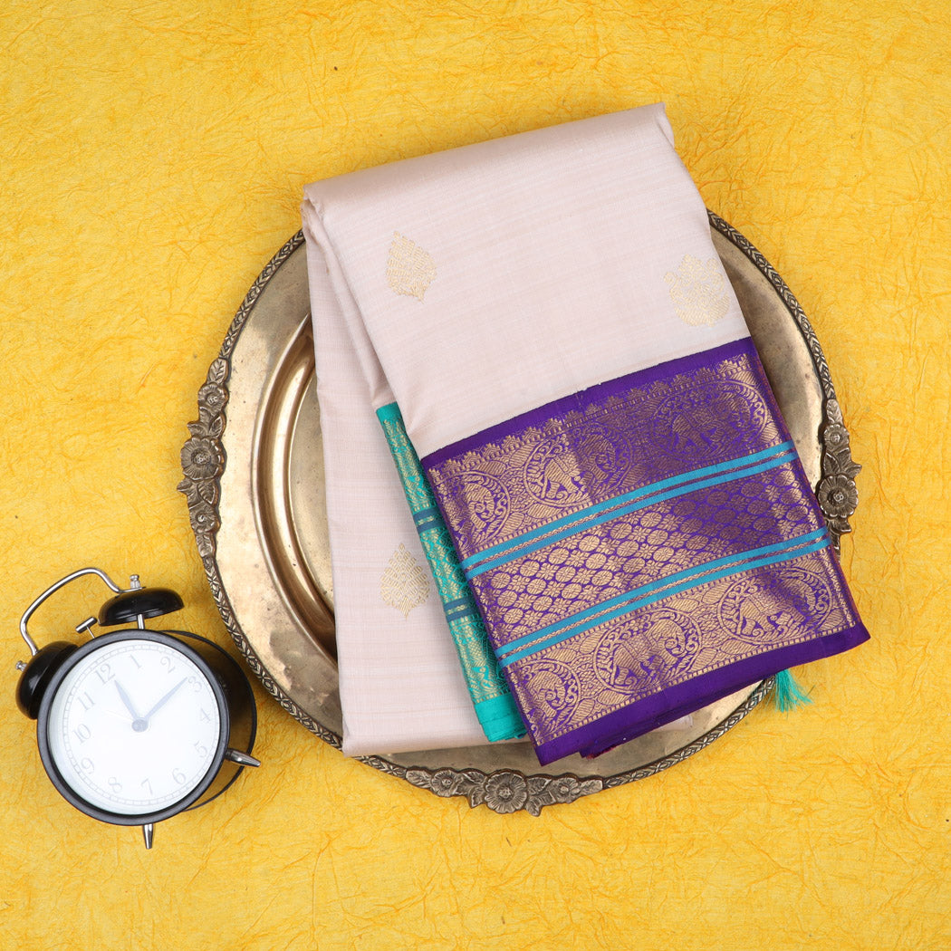 Pale Pink Kanjivaram Silk Saree With Floral Buttas