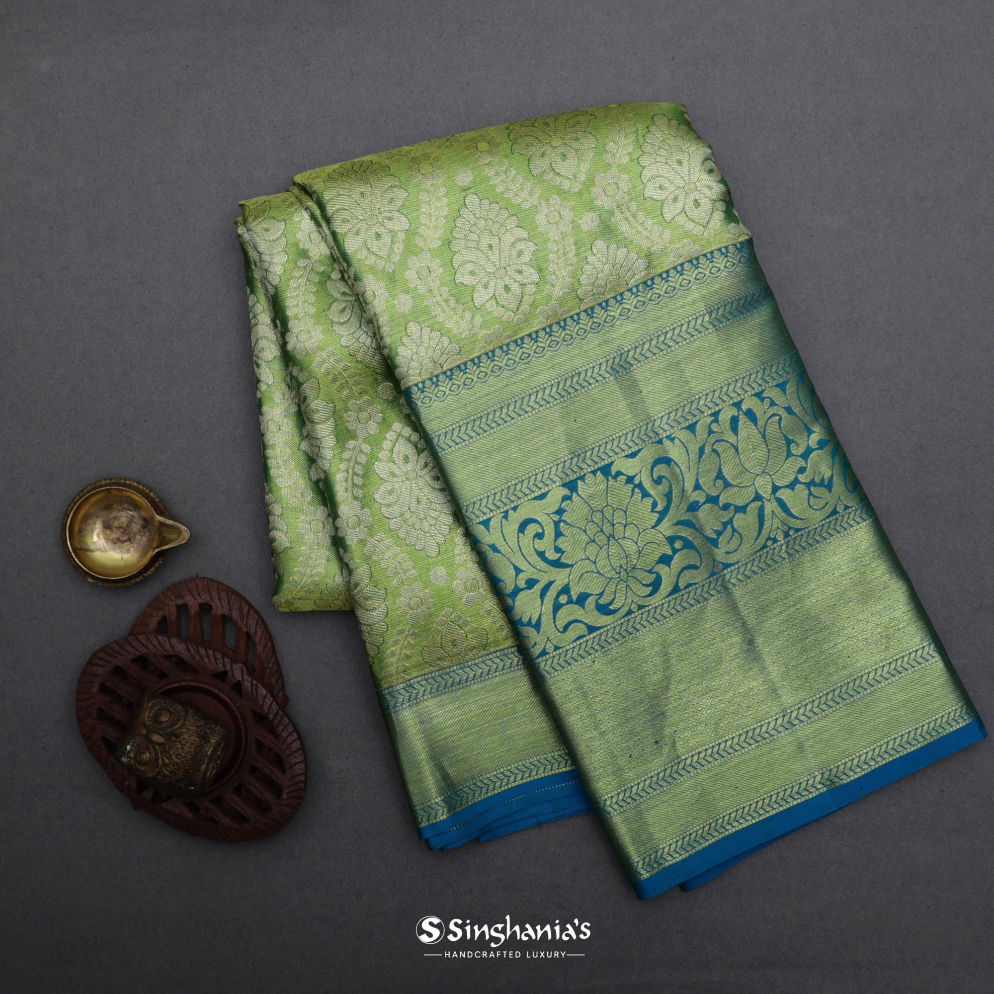 Pastel Olive Green Kanjivaram Silk Saree With Floral Design