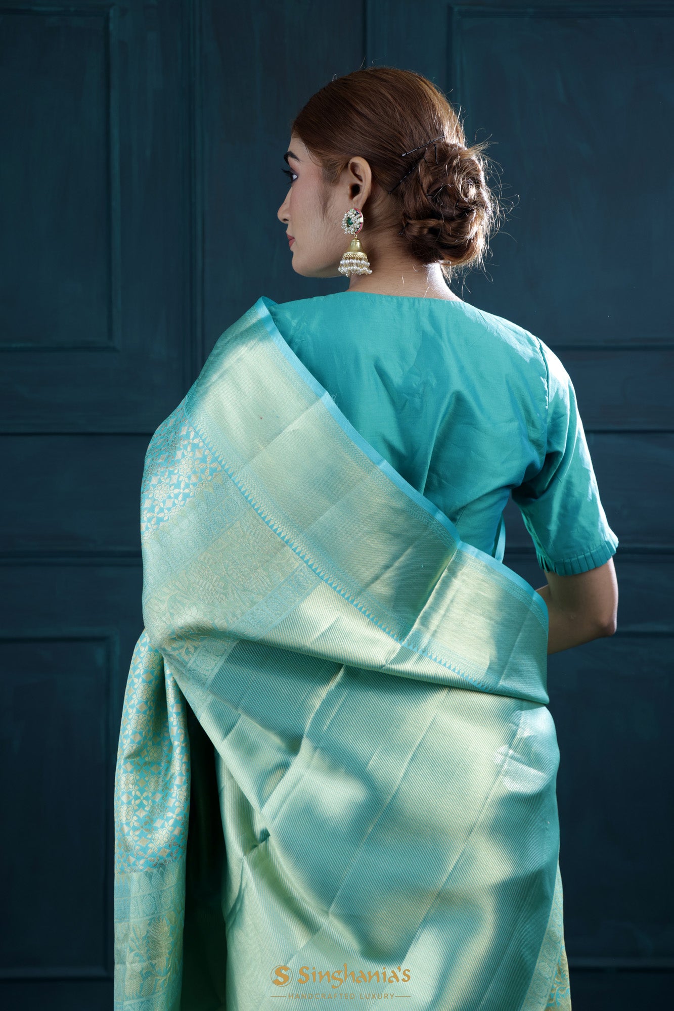 Turquoise Blue Kanjivaram Silk Saree With Floral Jaal Weaving