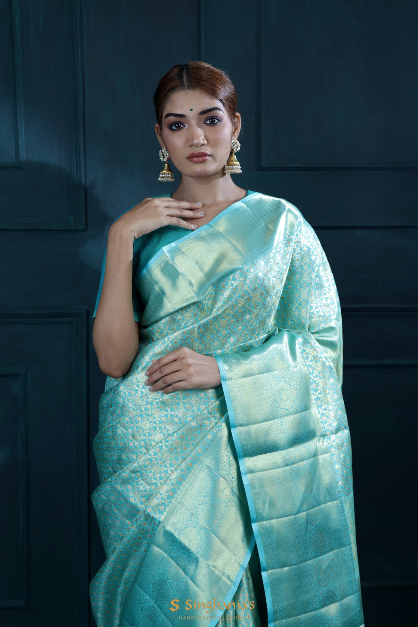 Turquoise Blue Kanjivaram Silk Saree With Floral Jaal Weaving