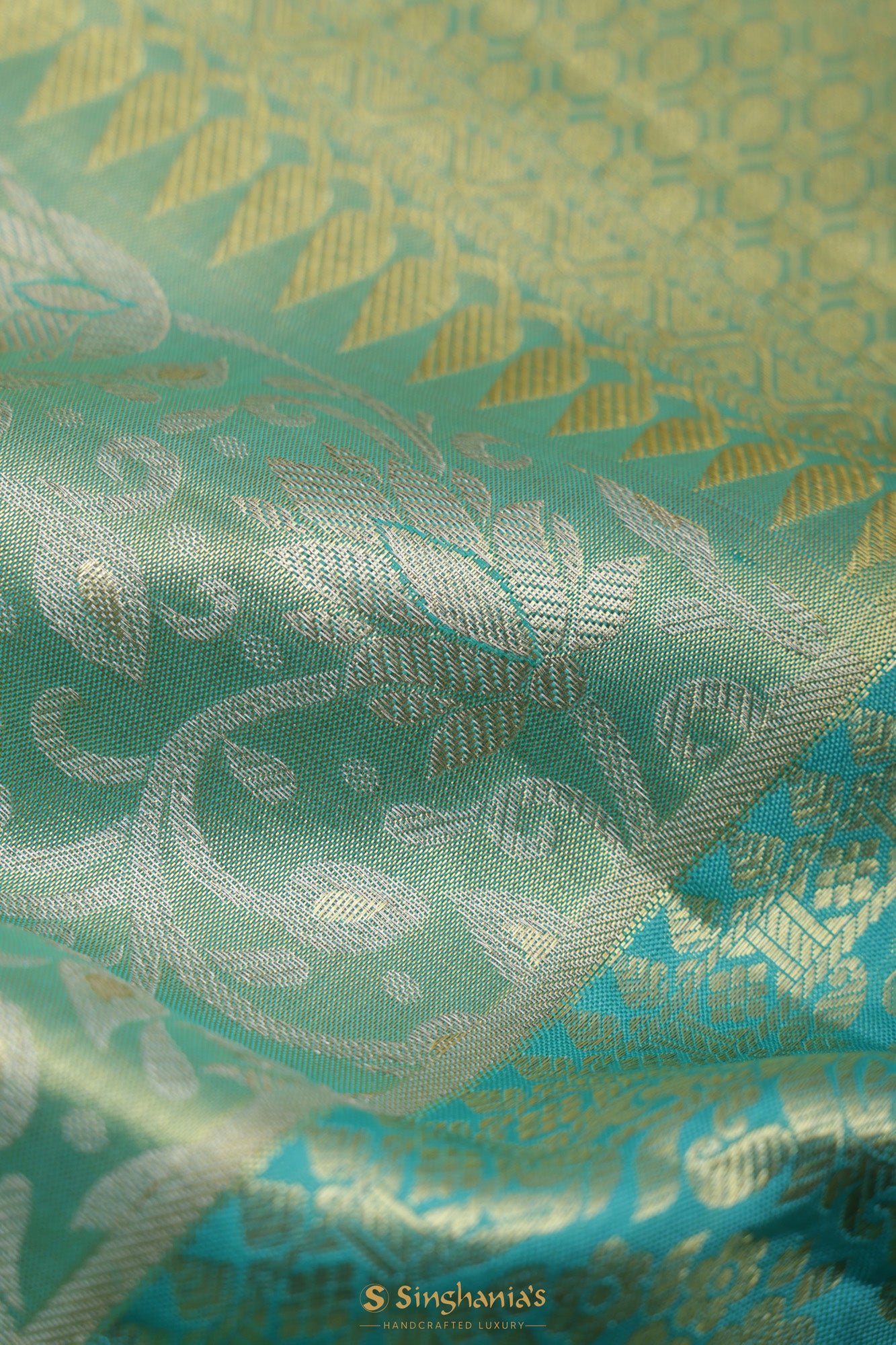 Blue-Green Tissue Kanjivaram Saree With Floral Jaal Weaving